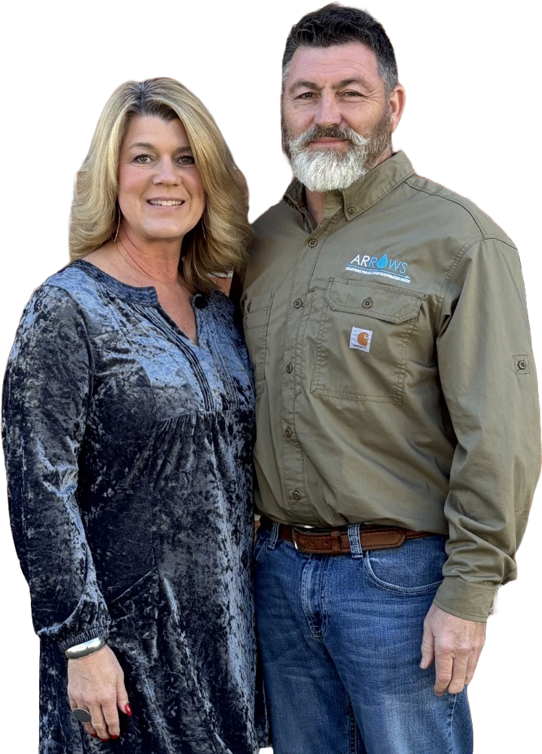 Andy and Gina standing side by side