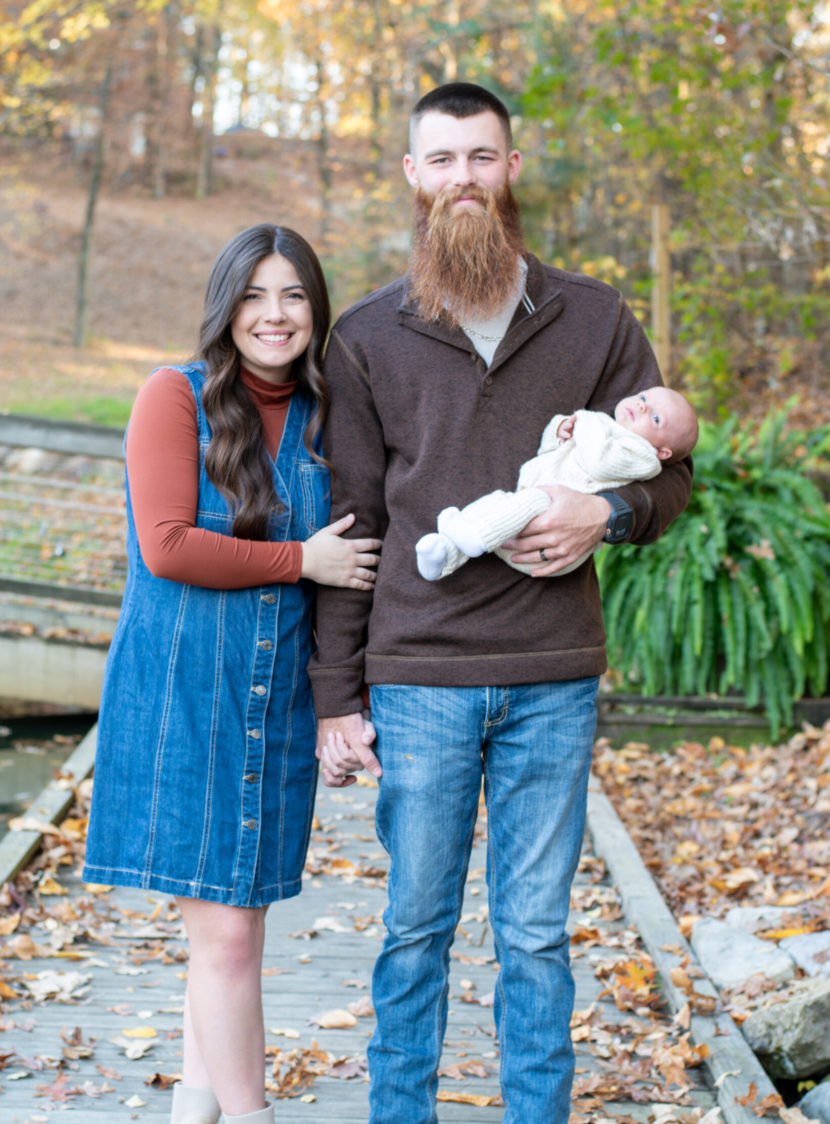 Roman Black with his wife and baby